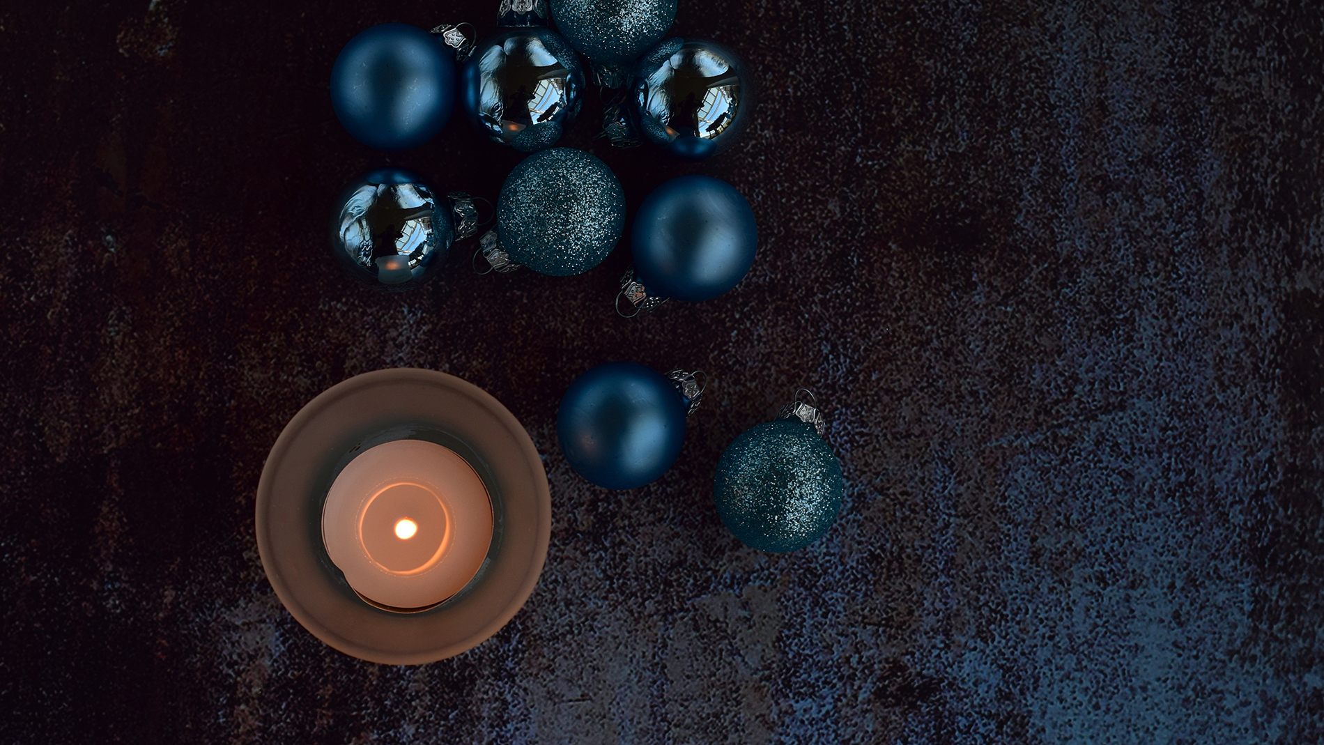 blue christmas balls with candle